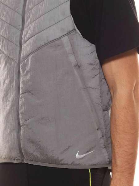 Жилет пуховой